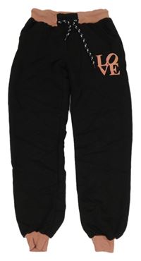 Černo-růžové tepláky s nápisem 