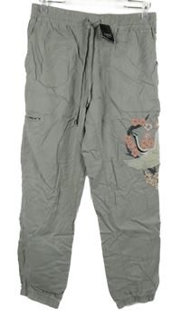 Nové - Dámské šedé cuff kalhoty s volavkou Next 