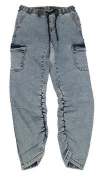 Světlemodré teplákové cuff rifle s kapsami