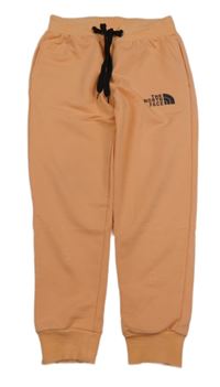 Broskvové tepláky s logem The North Face