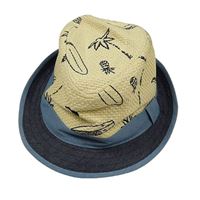 Béžovo-modrý klobouk s obrázky Pusblu 