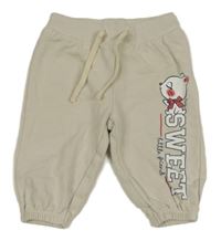 Béžové tepláky s kočkou