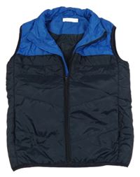 Tmavomodrá šusťáková zateplená vesta Name it