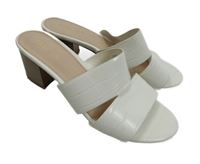 Dámské bílé koženkové pantofle na podpatku Carvela vel. 38