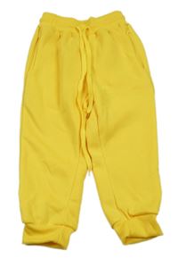 Tmavožluté teplé tepláky 