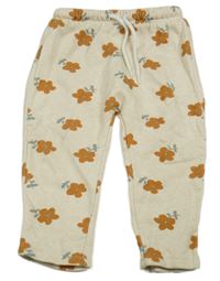 Béžové melírované květované tepláky Kiabi