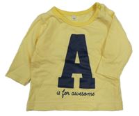 Žluto-bílé pruhované triko s písmenem