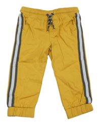 Žluté plátěné kalhoty s pruhem 