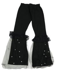 Černé flare kalhoty s tylem a korálky 