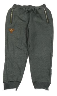 Tmavošedé melírované tepláky s nášivkou