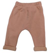 Růžové zateplené baggy tepláky Kiabi