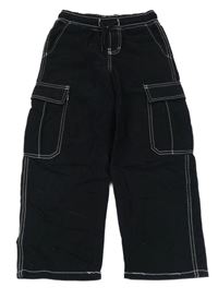 Černé široké rifle s kapsami Chapter young