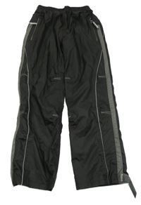 Černo-tmavošedé šusťákové podšité kalhoty s pruhem