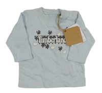 Nové - světlemodré triko s puzzlíky a logem Timberland