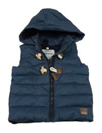 Tmavomodrá šusťáková prošívaná zateplená vesta s kapucí Topomini