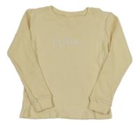 Světložluté žebrované triko s nápisem 