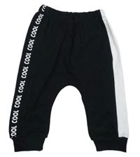 Černo-bílé tepláky s nápisy 