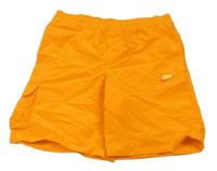 Neonově oranžové plážové kraťasy s logem Nike