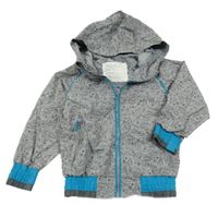 Světlešedo-modrá šusťáková podšitá bunda s obrázky a kapucí 