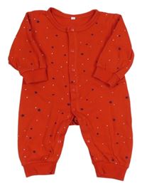 Červený overal s hvězdičkami 