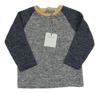 Nové - Tmavomodré melírované úpletové triko s kapsou Tu