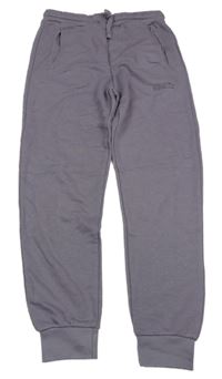 Fialové tepláky s nápisem Zara