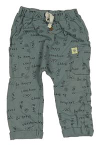 Šedé tepláky s nápisy Nutmeg