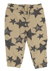 Béžové tepláky s hvězdičkami zn. Primark