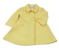 Žlutý vzorovaný kabát s límečkem z. Bonnie Baby