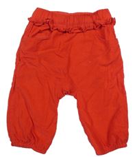 Červené podšité manšestráky s volánky 