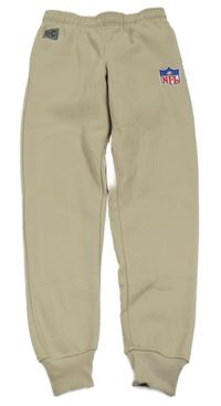 Béžové tepláky s nášivkou NFL