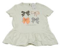 Nové - bílá tunika s mašličkami Nutmeg