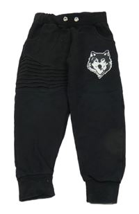 Černé tepláky s vlkem 