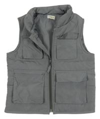 Šedá šusťáková zateplená vesta s kapsami F&F