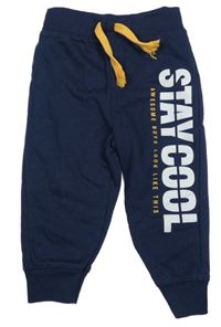 Tmavomodré tepláky s nápisem Dopodopo