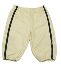 Světlebéžové tepláky s pruhem SHEIN