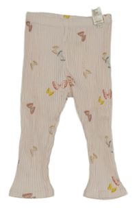 Světlerůžové žebrované legíny s motýlky 