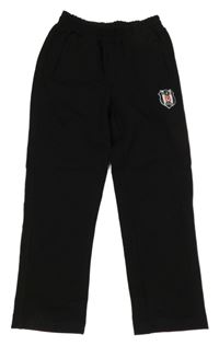 Černé tepláky s erbem 