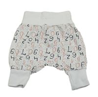 Bílé puntíkaté turecké tepláky s číslicemi 