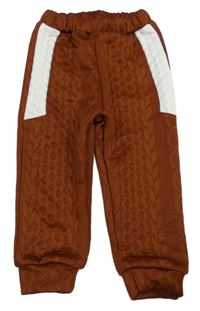 Hnědo-bílé vzorované tepláky