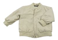 Béžový šusťákový zateplený bomber se smajlíkem Primark