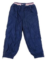 Tmavomodro-růžové šusťákové podšité cuff kalhoty Nike 