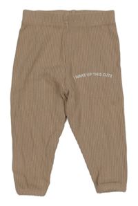 Pudrové žebrované tepláky s nápisem