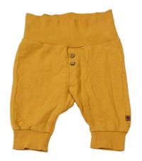 Okrové tepláky s knoflíčky 