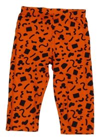 Tmavooranžovo-černé vzorované capri legíny s Mickey zn. Disney