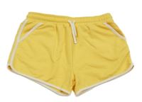 Žluté teplákové kraťasy s bílým lemem Primark