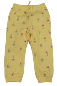 Žluté tepláky s kytičkami Primark