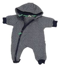 Tmavomodrá melírovaná prošívaná tepláková kombinéza s kapucí 