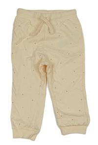 Meruňkové puntíkaté tepláky So Cute