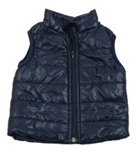 Tmavomodrá šusťáková zateplená prošívaná vesta 